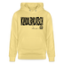 hellgelber Unisex Bio Hoodie mit großem KLADDERADATSCH Schriftzug im Berliner Schnauze Design, gerade geschnitten, schwarzer Aufdruck auf der Vorderseite. 