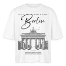 Lässiges, boxy geschnittenes Frauen T-Shirt mit großem 'Berlin'-Print und Brandenburger Tor Illustration, aus 100% Bio-Baumwolle. - Weiß