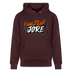 Unisex Hoodie mit 'HAUPTSTADTJÖRE' Brustprint, 100% Bio-Baumwolle, fair produziert, extra kuschelig, mit Berliner Style und hochwertiger Verarbeitung. - farbe Maroon