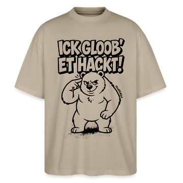 Berlin Shirt mit schwarzem Comicstyle-Print „ICK GLOOB ET HACKT“und darunter der Berliner Bär, der sich an den Kopf tippt. als sandfarbenes oversized Unisex T-Shirt mit Berliner Spruch und übergrosser, lässiger Passform
