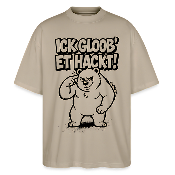Berlin Shirt mit schwarzem Comicstyle-Print „ICK GLOOB ET HACKT“und darunter der Berliner Bär, der sich an den Kopf tippt. als sandfarbenes oversized Unisex T-Shirt mit Berliner Spruch und übergrosser, lässiger Passform