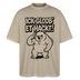 Berlin Shirt mit schwarzem Comicstyle-Print „ICK GLOOB ET HACKT“und darunter der Berliner Bär, der sich an den Kopf tippt. als sandfarbenes oversized Unisex T-Shirt mit Berliner Spruch und übergrosser, lässiger Passform