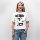Weißes Frauen Bio-T‑Shirt mit Berliner Bär und dem Spruch „Nett kann ick ooch – bringt aber nüscht“ auf der Vorderseite.
