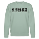Hell Graugrüner Unisex Sweater mit Rundhalsausschnitt und Berliner Spruch „KEENE ANGST ICK TU SIE NÜSCHT“ in schwarzer Schrift, mittig auf der Brust platziert, ergänzt mit einem grimmig guckenden Cartoon-Engel zwischen den Wörtern
