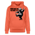 Unisex Hoodie mit Berliner Schnauze Spruch in schwarz „ICK MACH WAT ICK WILL“ -Illustration vom tanzenden Berliner Bär mit erhobenem Mittelfinger-aus Bio-Baumwolle hellrot