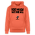 Hellroter Hoodie mit schwarzem Aufdruck „ICK MACH WAT ICK WILL“ im Berliner Schnauze Stil, designed by findickjut