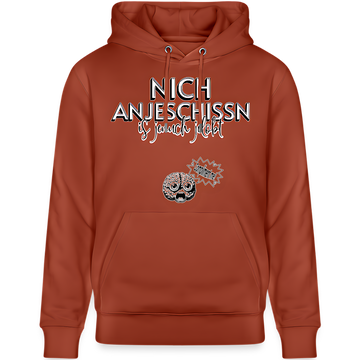 terrakotta farbener unisex Hoodie-weisser druck schwarz umrandet 'Nich anjeschissen is jenuch jelobt' - darunter ein illustriertes gehirn mit erschrockenem Blick und Sprechblase "Compliment me"